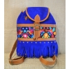 Plecak damski boho  ze skóry zamszowej  w kolorze jasnoniebieskim z kolorowym kwiatowym  haftem.
