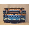 Torebka etniczna z granatowej zamszowej skóry i wełnianej haftowanej tkaniny .