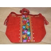 Torebka worek etno ze skóry czerwona z kwiatowym haftem .