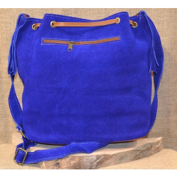 Torebka worek etno ze skóry niebieska z kwiatowym haftem .